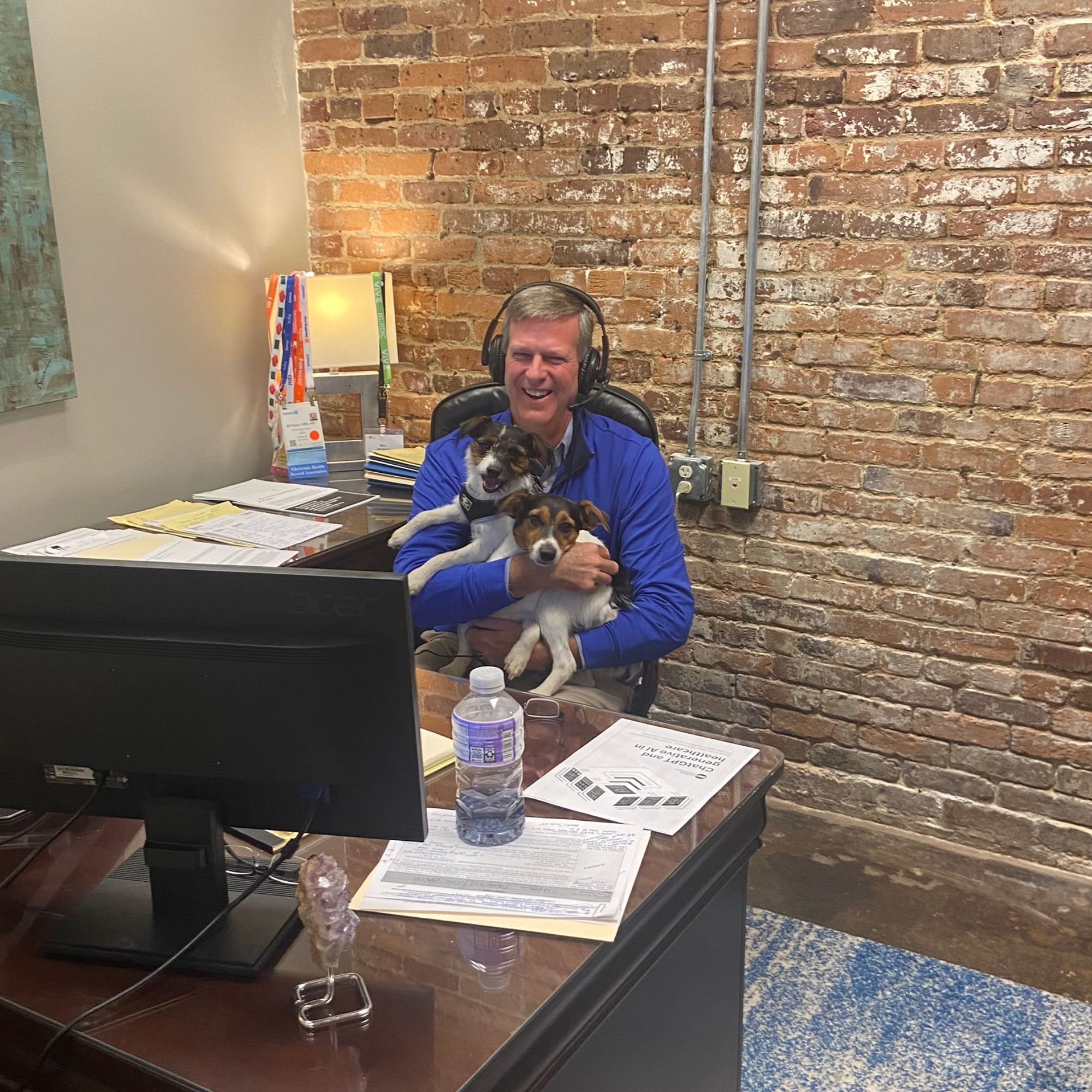 Man in office with dogs